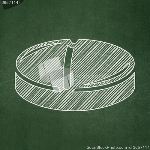 Image of Health concept: Pill on chalkboard background