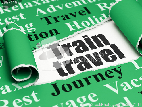 Image of Travel concept: black text Train Travel under the piece of  torn paper