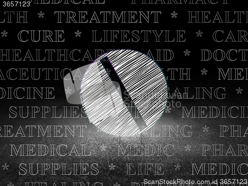Image of Health concept: Pill in grunge dark room