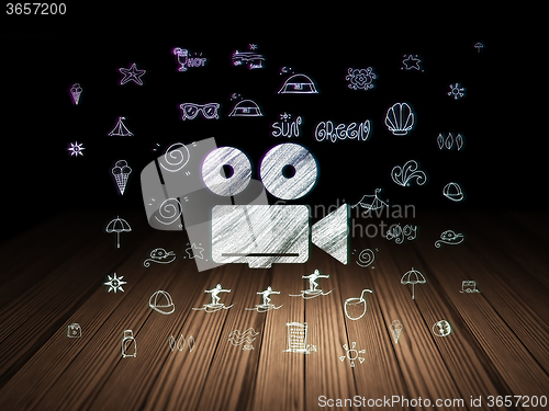 Image of Tourism concept: Camera in grunge dark room