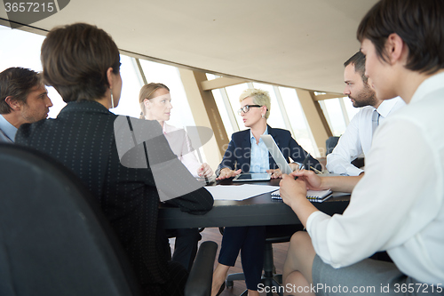 Image of business people group on meeting at office