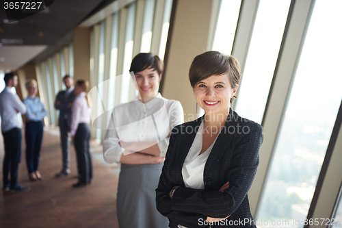 Image of business people group, females as team leaders