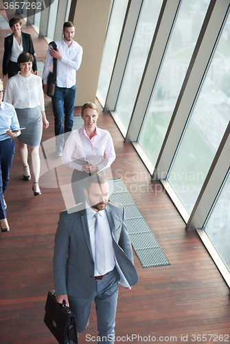 Image of business people group walking