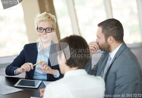 Image of business people group on meeting at office