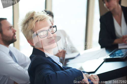 Image of blonde business woman on meeting