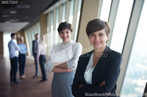 Image of business people group, females as team leaders