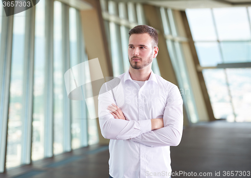 Image of business man with beard at modern office