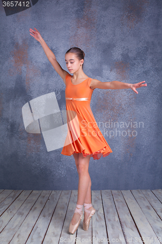 Image of The young ballerina dancing  