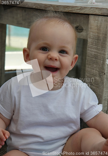Image of Portrait of smiling baby girl
