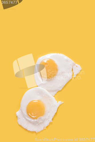 Image of Fried eggs on yellow