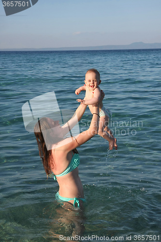 Image of Mother with her baby girl