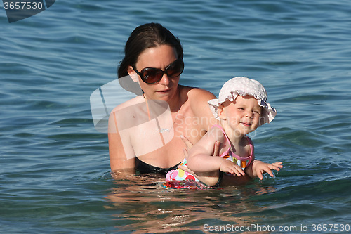 Image of Baby girl with her mother