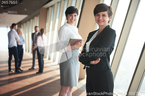 Image of business people group, females as team leaders