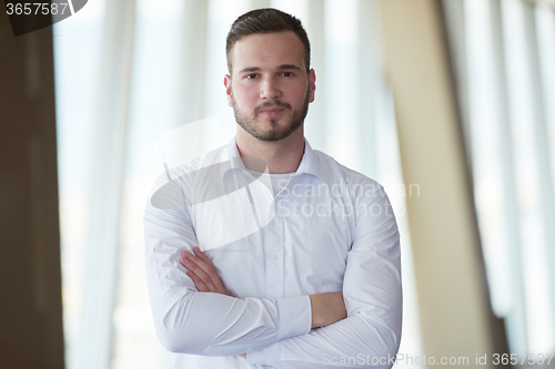 Image of business man with beard at modern office