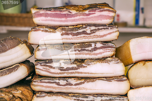 Image of Smoked Bacon in a street market