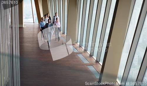 Image of business people group walking