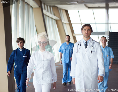 Image of doctors team walking