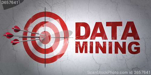 Image of Information concept: target and Data Mining on wall background
