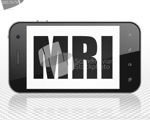 Image of Healthcare concept: Smartphone with MRI on display