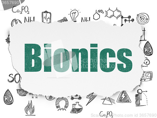 Image of Science concept: Bionics on Torn Paper background