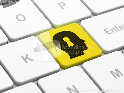 Image of Business concept: Head With Keyhole on computer keyboard background