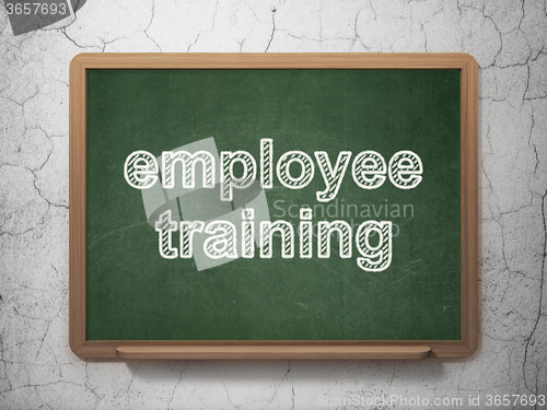 Image of Learning concept: Employee Training on chalkboard background