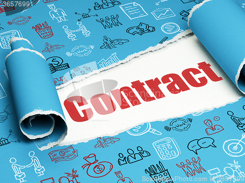 Image of Business concept: red text Contract under the piece of  torn paper