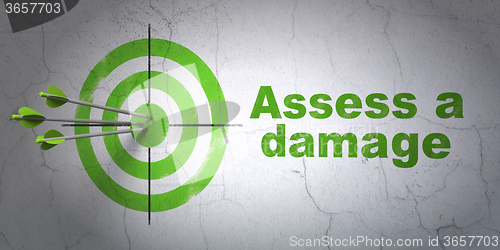 Image of Insurance concept: target and Assess A Damage on wall background