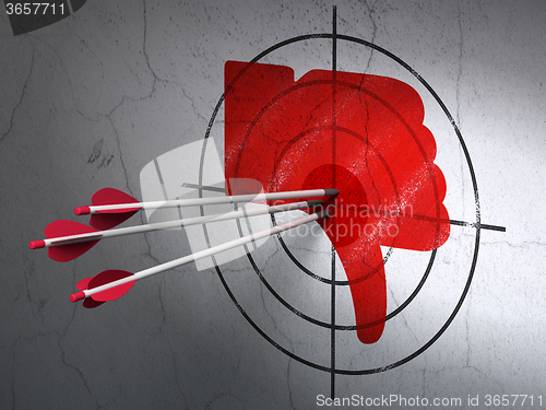 Image of Social media concept: arrows in Thumb Down target on wall background