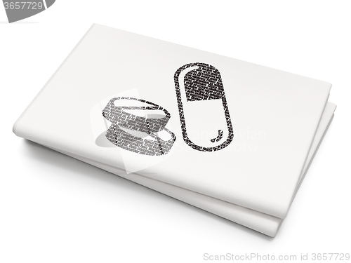Image of Healthcare concept: Pills on Blank Newspaper background