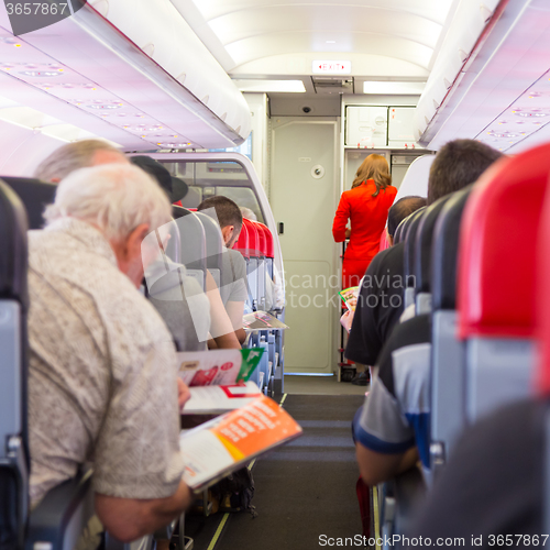 Image of Passengers on the airplane.