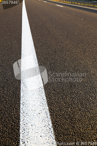 Image of road markings  on the asphalt