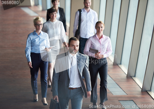 Image of business people group walking