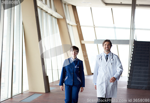 Image of doctors team walking