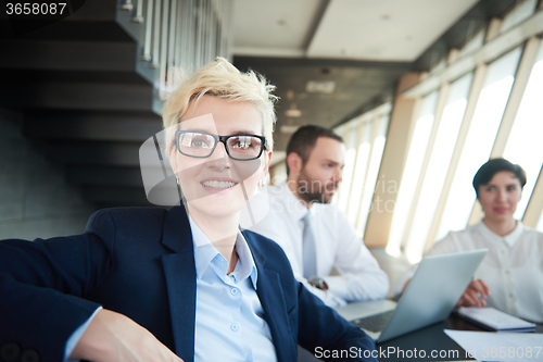 Image of blonde business woman on meeting