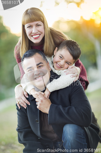 Image of Young Mixed Race Family Portrait Outdoors