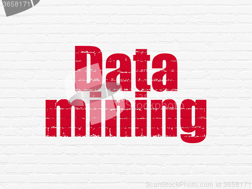 Image of Data concept: Data Mining on wall background