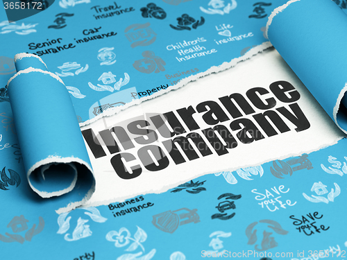 Image of Insurance concept: black text Insurance Company under the piece of  torn paper