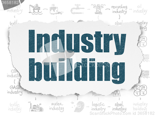 Image of Industry concept: Industry Building on Torn Paper background