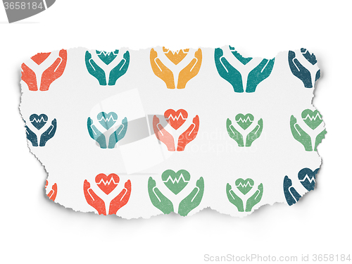 Image of Insurance concept: Heart And Palm icons on Torn Paper background