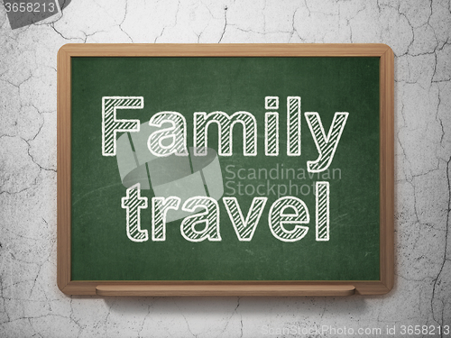 Image of Vacation concept: Family Travel on chalkboard background