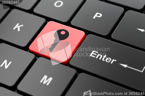 Image of Protection concept: Key on computer keyboard background