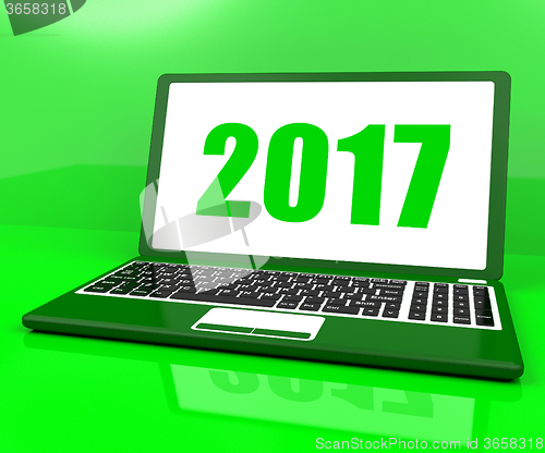 Image of Two Thousand And Seventeen On Laptop Shows Year 2017