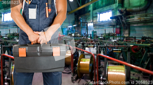 Image of Worker with instruments