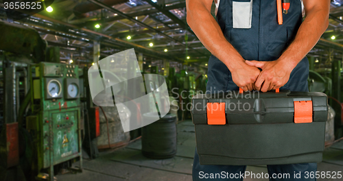 Image of Worker with instruments