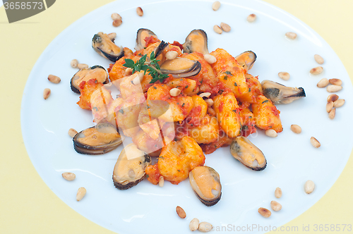 Image of Gnocchi with tomato sauce with mussels