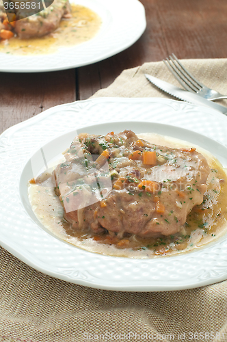 Image of 
marrowbone, veal cut used in Italian cooking with yellow risott