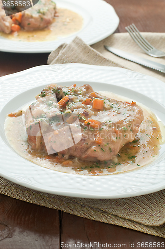 Image of 
marrowbone, veal cut used in Italian cooking with yellow risott