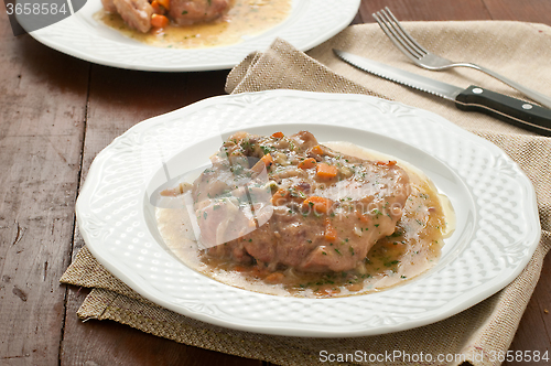 Image of 
marrowbone, veal cut used in Italian cooking with yellow risott