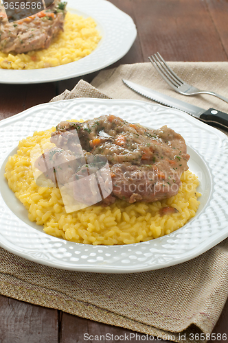 Image of 
marrowbone, veal cut used in Italian cooking with yellow risott